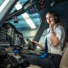 female pilot in small airplane