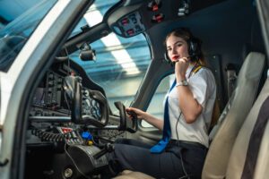 female pilot in small airplane